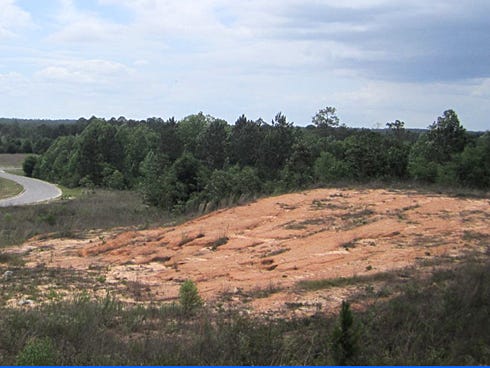 Looking west from the Ryan's parking lot, land at right could become a 144-acre shopping center if negotiations at a Tuesday workshop at City Hall are fruitful.