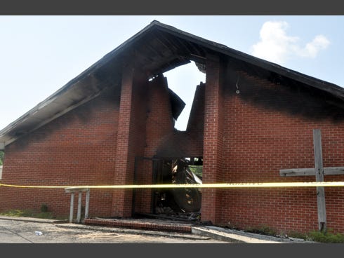 Full Gospel Tabernacle Church’s brick walls remain standing, but a Wednesday evening fire ruined everything else. The church's pastor, Steve Bolton, said he and his congregation will rebuild.