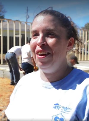 Jamie Peoples will live with her three children inside her new Habitat home once construction is completed.