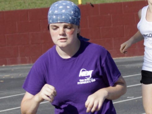 Baker School's Anna Scott is the girls cross country team's only senior and Gator Coach Chad Lawhon said she has a leadership heart.