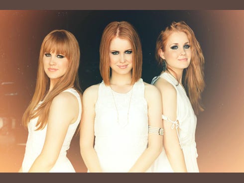 Red Roots members Nika, Natalie and Nicole Taylor of Wade, Miss., have performed in Branson, Missouri, Nashville and the Niceville Mullet Festival.