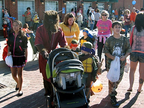 More than 10,000 people visited Main Street Oct. 26 to see the costume contest, play games, participate in the skillet toss and a pet parade and enjoy food.