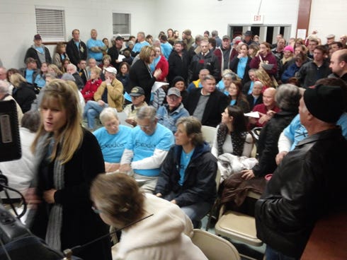 North Okaloosa residents interested in Exodos Ministries' plans to build a substance abuse rehabilitation facility on Buck Ward Road packed the Baker Community Center to standing room only on Thursday.