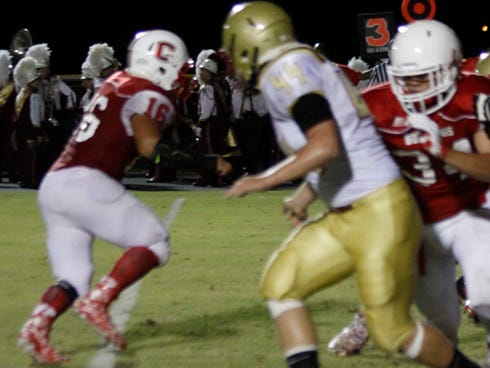 Crestview High School linebacker Corey Armstrong moved to quarterback following an injury to Rusty Moorer and scored three touchdowns, leading the Bulldogs to a win over Northview on Friday.