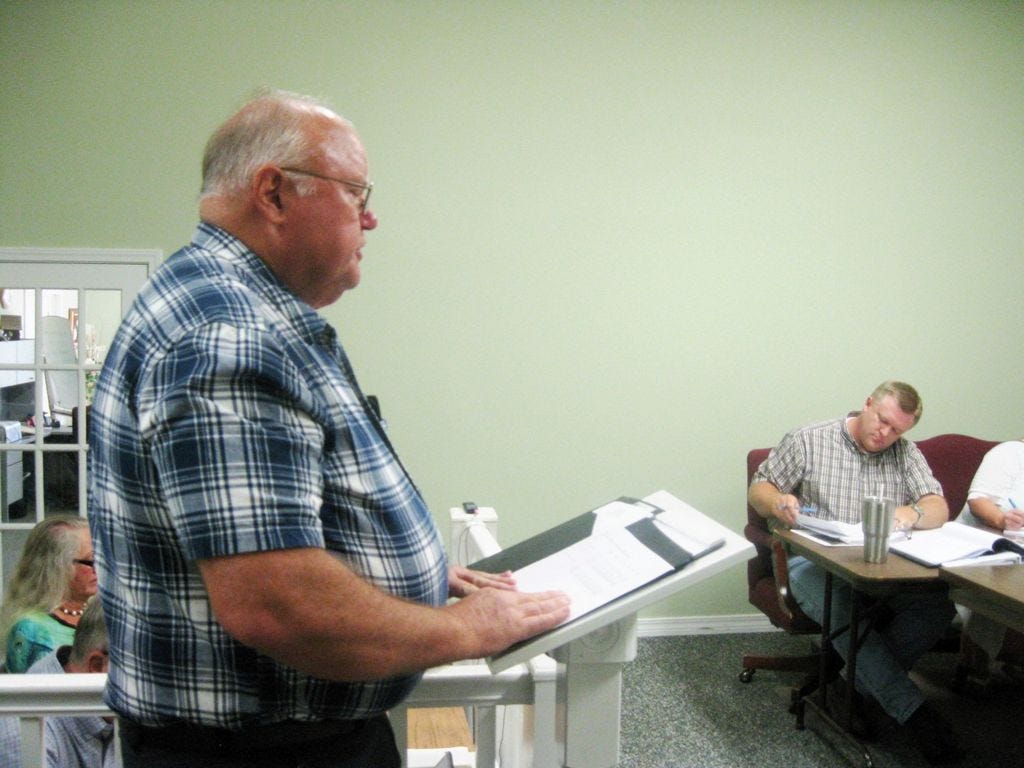 Laurel Hill auditor Joe Jones presents a report on the city's finances to the City Council July. 7.