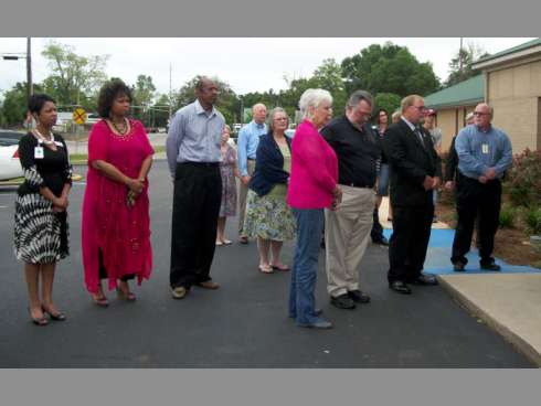More than 30 residents and community leaders at midday Thursday gathered in front of City Hall to observe the National Day of Prayer.