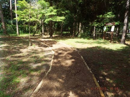 Volunteers from the Crestview Kiwanis Club, Boy Scouts Troop 30 and the Emerald Coast Young Marines completed the eighth-mile-long McMahon Center walking path in half the planned eight hours.