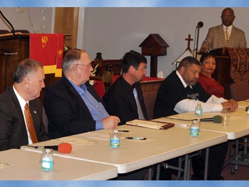 Panel members discuss national and local issues Sunday night at New Life Missionary Baptist Church. The discussion was one activity to celebrate Martin Luther King Jr. Day.
