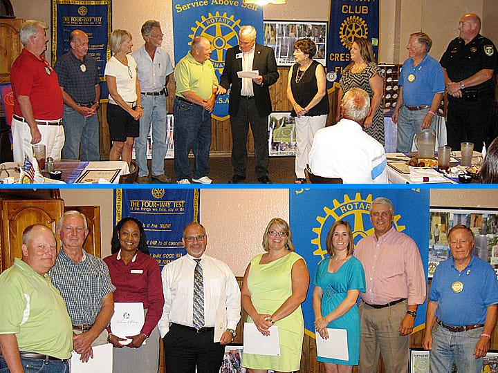 TOP, New Crestview Rotary Club officers are Don Turner, past president; Chad Wilkinson, director; Kim Day-Scheid, treasurer; Ronnie Lunsford, sergeant-at-arms; Mike Carroll, president; John Blair, assistant district governor; Pat Hollarn, secretary; Allyson Oury, president elect; Bill Barnhill, director; and Capt. Larry Ward, director.
BOTTOM: The Crestview Rotary Club inducted one of its largest classes of new members during its June 25 meeting. From left are new President Mike Carroll, new members John Hughes, Katina White, Keat Baker, Courtney Huffstutler, Rebecca Casarez and John Hofstad; and club director Bill Barnhill.