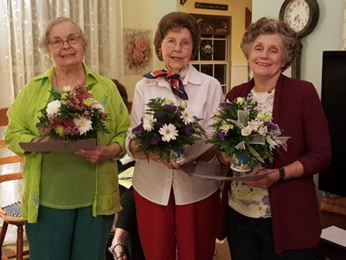 Dogwood Garden Club charter members Clara Jo Teel, Bobbie Grice, Beach Campbell and Eva Fountain, not pictured, are honored for 50 years of service.