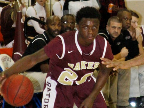 Baker School's Junior McLaughlin is an eighth-grader starting for the varsity basketball team.