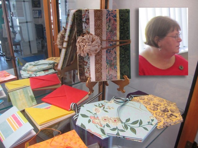 Members of The Experimental Artists Book Arts Guild, or TeaBAG, including Baker artist Mary Richardson, inset, created these examples of bookbinding art on display at the Crestview Public Library.
