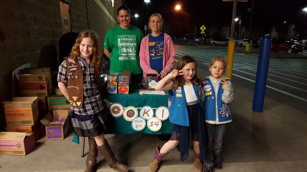 Crestview Troop 676 Brownie Abigail Converse, and Daisies Kaylyn Converse and Miley Milani, front row, are pictured with Troop Leader Jaime Tambone and parent volunteer Melissa Milani at the Crestview Wal-Mart.