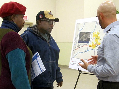 Crestview residents Sharon Brown-Halmon and Earl Halmon offer suggestions for Interstate 10 improvements to Florida Department of Transportation consulting engineer Ben Walker.