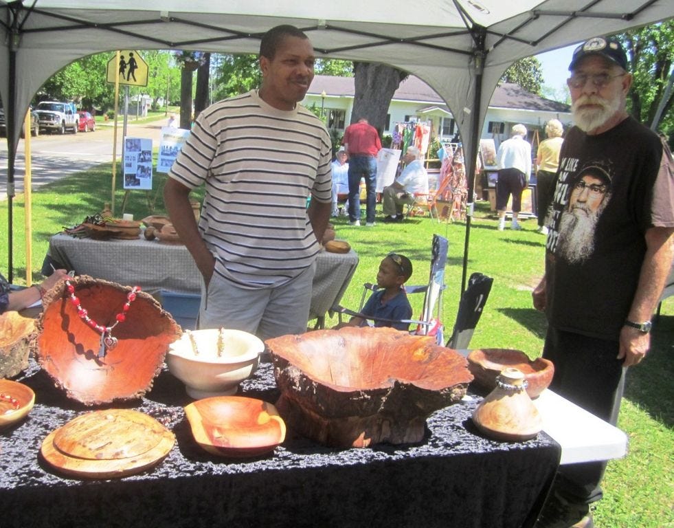 Wood turner Dannis Young, left, is among artists and crafters returning for Saturday's Laurel Hill Arts and Heritage Festival.