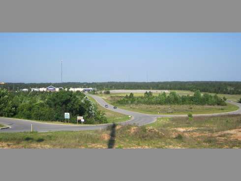 A partnership between the city of Crestview, developers and Beach Community Bank that would replace an aging sewer line and lead to the development of a shopping center to the right of Lowe's in this photo has run into a complication.