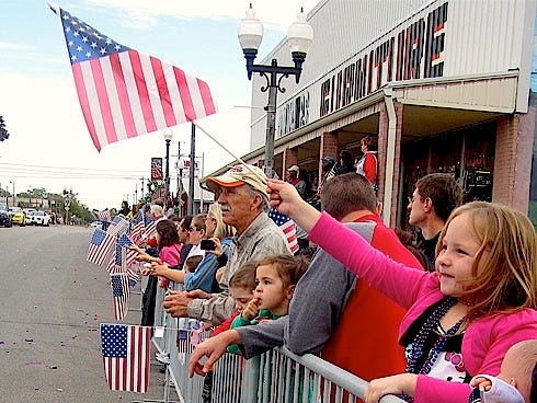 Samantha Daniels, then 5, held her colors high during last year’s Crestview Veterans Day Parade.