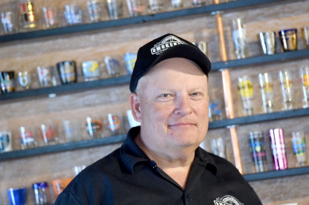 Hub City Smokehouse and Grill customers can trade a unique shot glass for a pulled pork sandwich, provided owner Mike Carroll deems the glass worthy of being added to the collection.