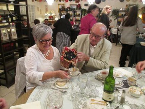 During dessert tea at Crestview's first Guest Chefs' Dinner Oct. 19, 2015, Gerard Moreau, a visitor from Noirmoutier, pours tea for his wife Marie-Therese.