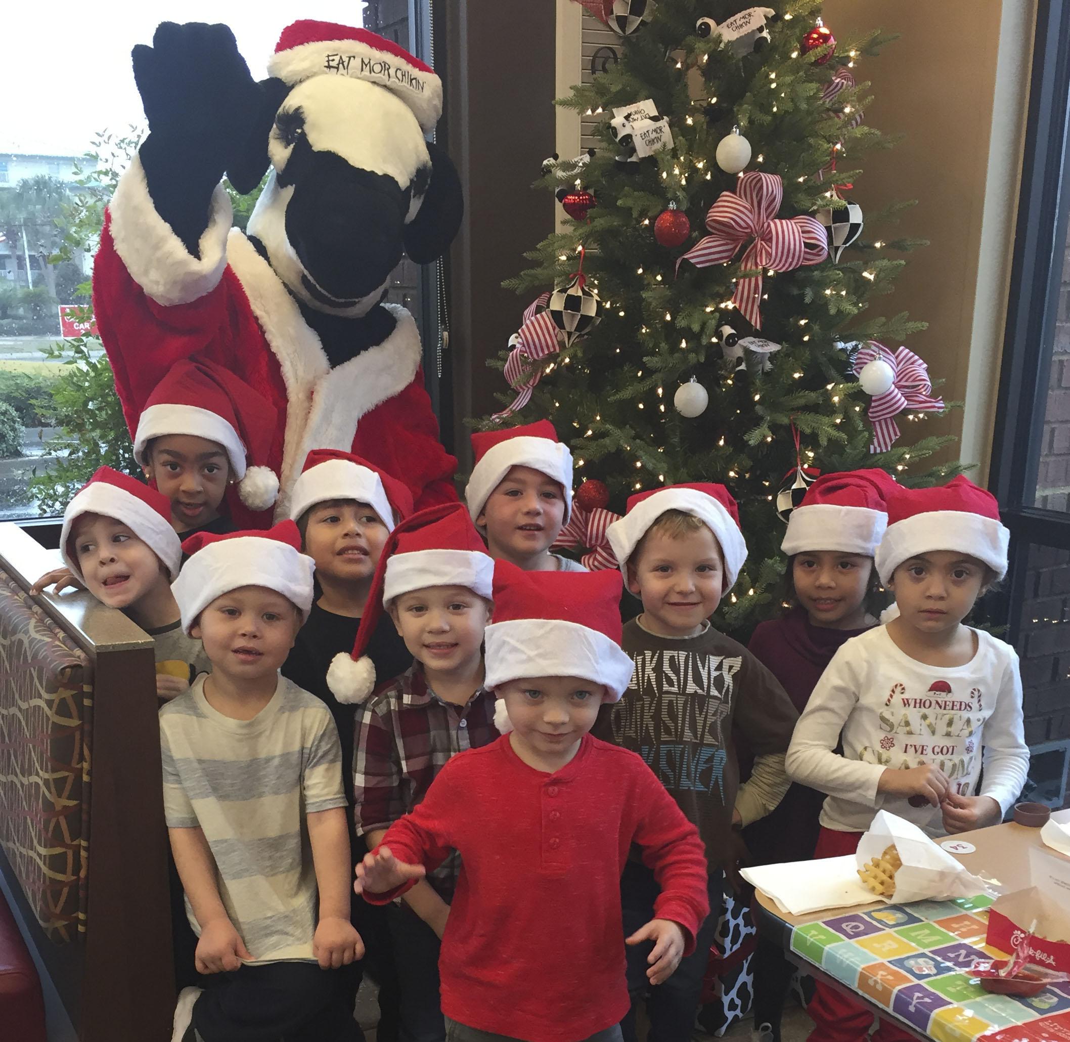 Ms Cindy’s Pre-K class from First Baptist Church of Destin Preschool enjoyed lunch and a visit from Santa Cow at Chick-fil-A. Owner Tripp Hill helped to make their visit a memorable one.