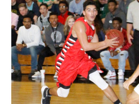 Marcus Purcell had a game-high 26 points for Crestview in Tuesday's District 2-6A loss to Fort Walton Beach.