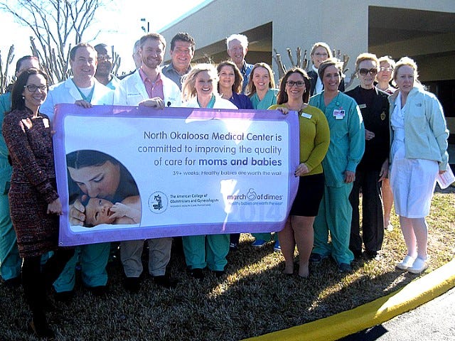 North Okaloosa Medical Center OB/GYN physicians, medical professionals and board members — pictured with the American College of Obstetricians and Gynecologists and March of Dimes representatives — work at one of just two hospitals in the county embracing the “39 Weeks” initiative.
