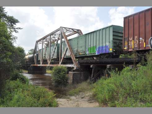 The railroad trestle crossing the Yellow River is where Mindy Raven Sabor, 22, was hit by an oncoming train Tuesday afternoon. CSX Corporation is investigating the incident.