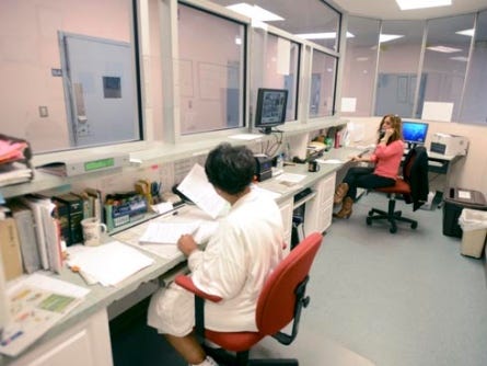 Workers man the nurses station Wednesday at the Bridgeway Center, Inc., Crisis Stabilization Unit on Shell Avenue on Fort Walton Beach.