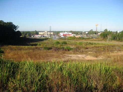 This rolling hill between State Road 85 and the Comfort Inn in Crestview could be the site of several new chain restaurants. City officials say they are actively facilitating the potential development.