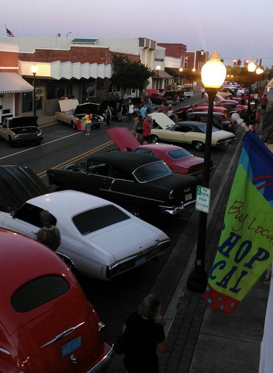 Classic automobiles line up along North Willing Street in downtown Milton during Saturday’s Milton Cruise-In. The event is sponsored by the Santa Rosa Arts and Culture Foundation and businessman Don Norris.