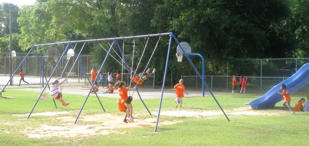 Children play in the Allen Park playground Friday morning during a Boys and Girls Club recreation period. The club's Crestview program will end Aug. 9.