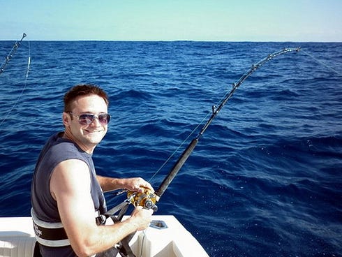 Florida Fish & Wildlife Commission employee Justin Lerner fishes for sailfish.
