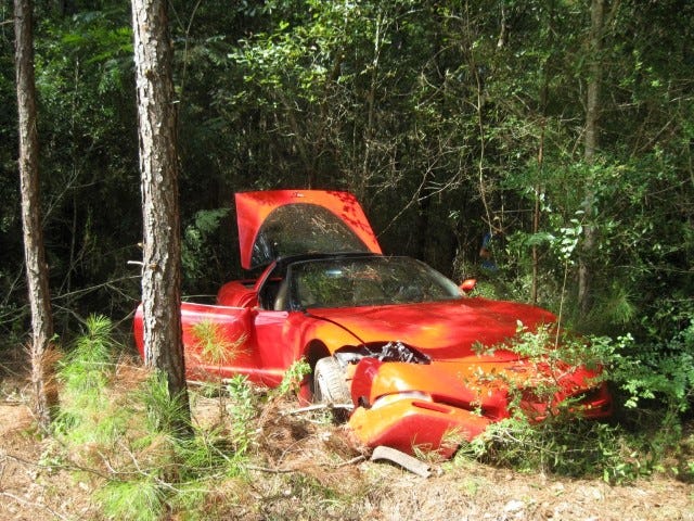 A 1999 Corvette came to rest in the woods off Farmer Street after it sustained a steering failure on a bend in the road, according to its driver.