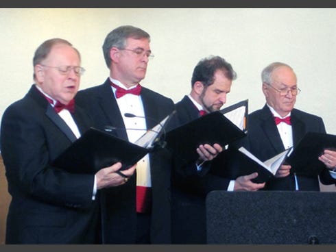 Featured soloist Richard Montague, left, performs "Wade in de Water" during Schola Cantorum's spring concert at First Presbyterian Church in Crestview.