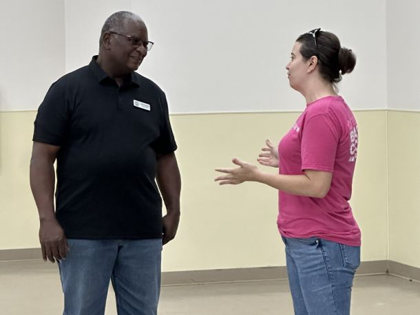 Jessica Leavins speaks with Precinct 2 Councilman Sylvester Echols